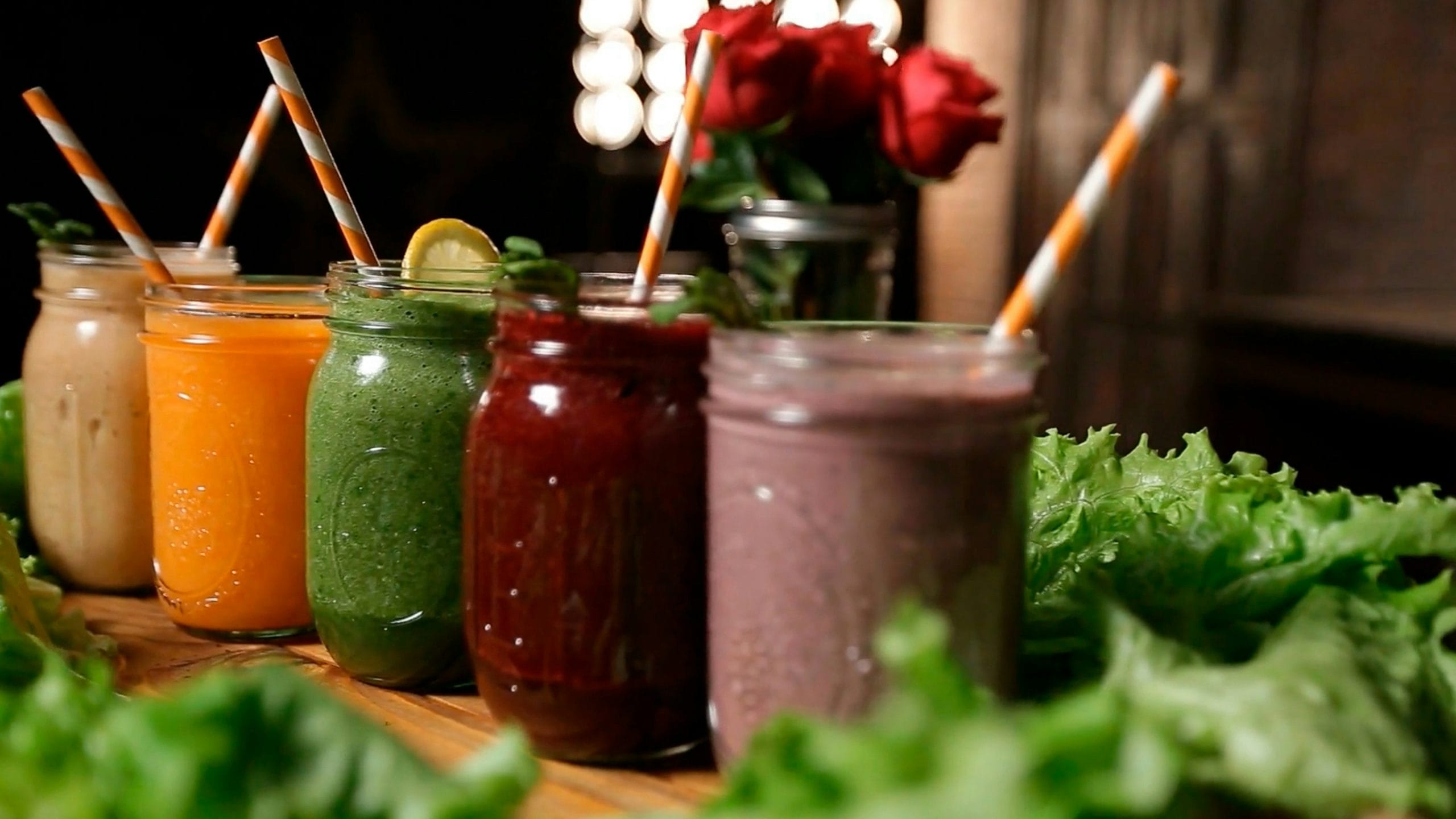 A red smoothie in a glass, an example of a smooth drink to sip without a straw during wisdom teeth recovery
