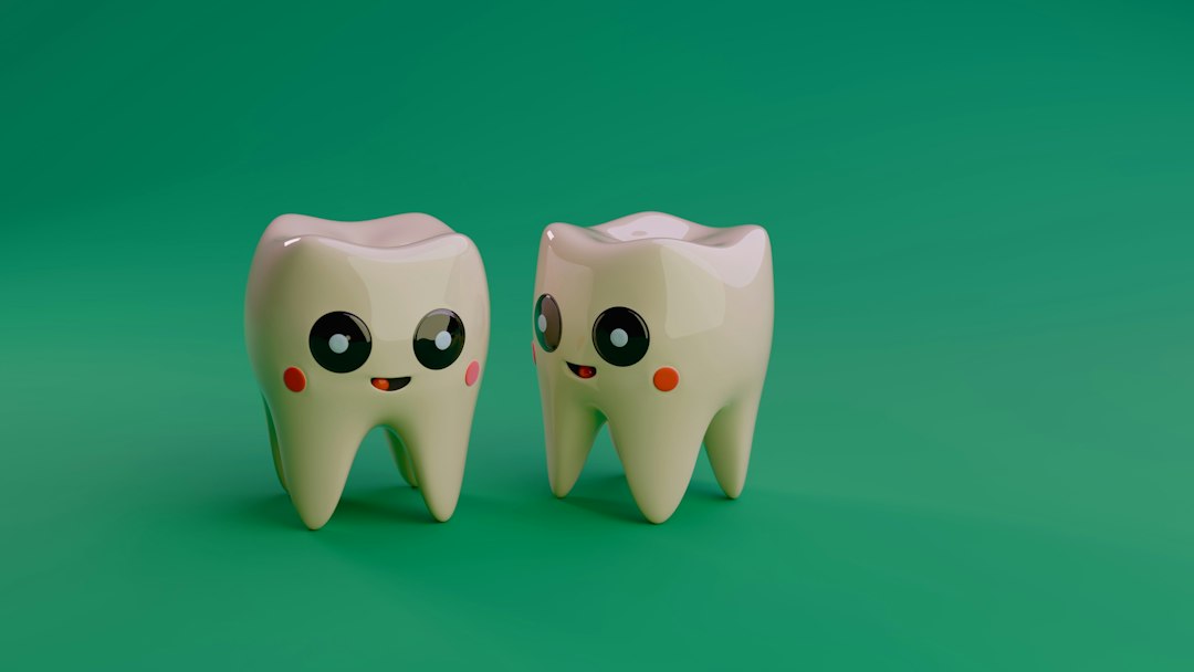 Two cute cartoon teeth smiling on a green background