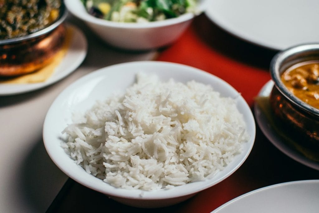 Soft cooked rice in a bowl for eating during wisdom teeth recovery